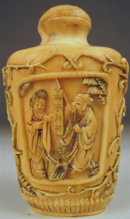 Appraisal: Chinese polychromed carved elephant ivory snuff bottle early th century