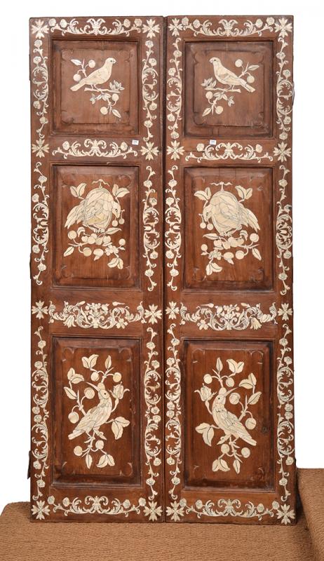 Appraisal: A PAIR OF BONE INLAID DOORS each door with three