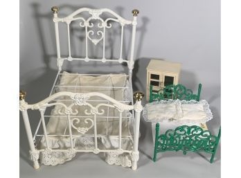 Appraisal: Including two cast iron bed frames one with linens and