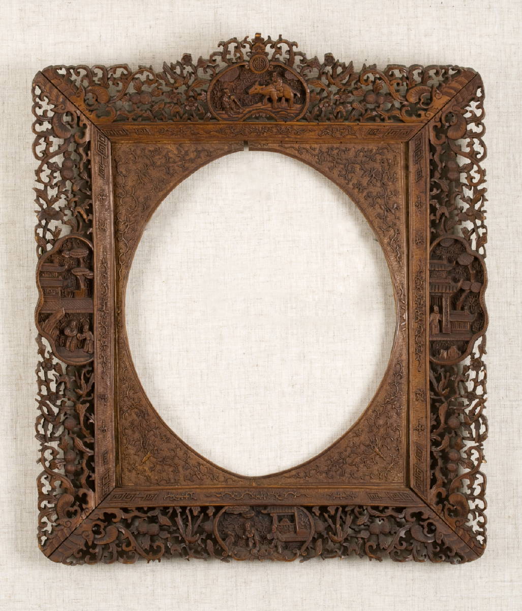 Appraisal: PAIR OF CHINA TRADE CARVED AND PIERCED TEAK WOOD FRAMES