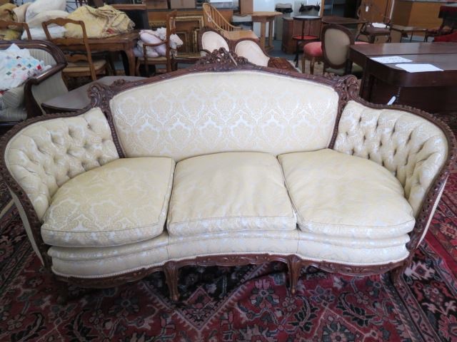 Appraisal: French Carved Walnut Sofa tufted sides down filled cushions wide