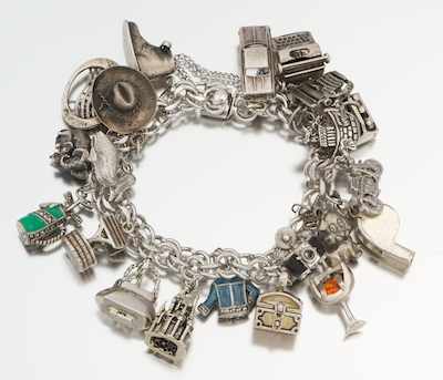 Appraisal: A Sterling Silver Charm Bracelet Sterling silver double link bracelet