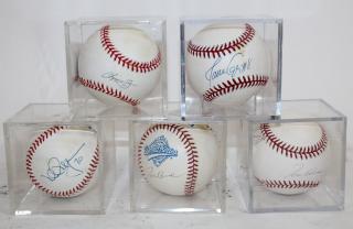 Appraisal: Lot of signed baseballs in cases Collection of signed Atlanta