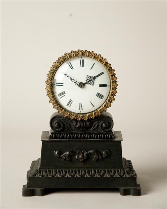 Appraisal: A Swiss Mantle Clock round white face with ornate gilt