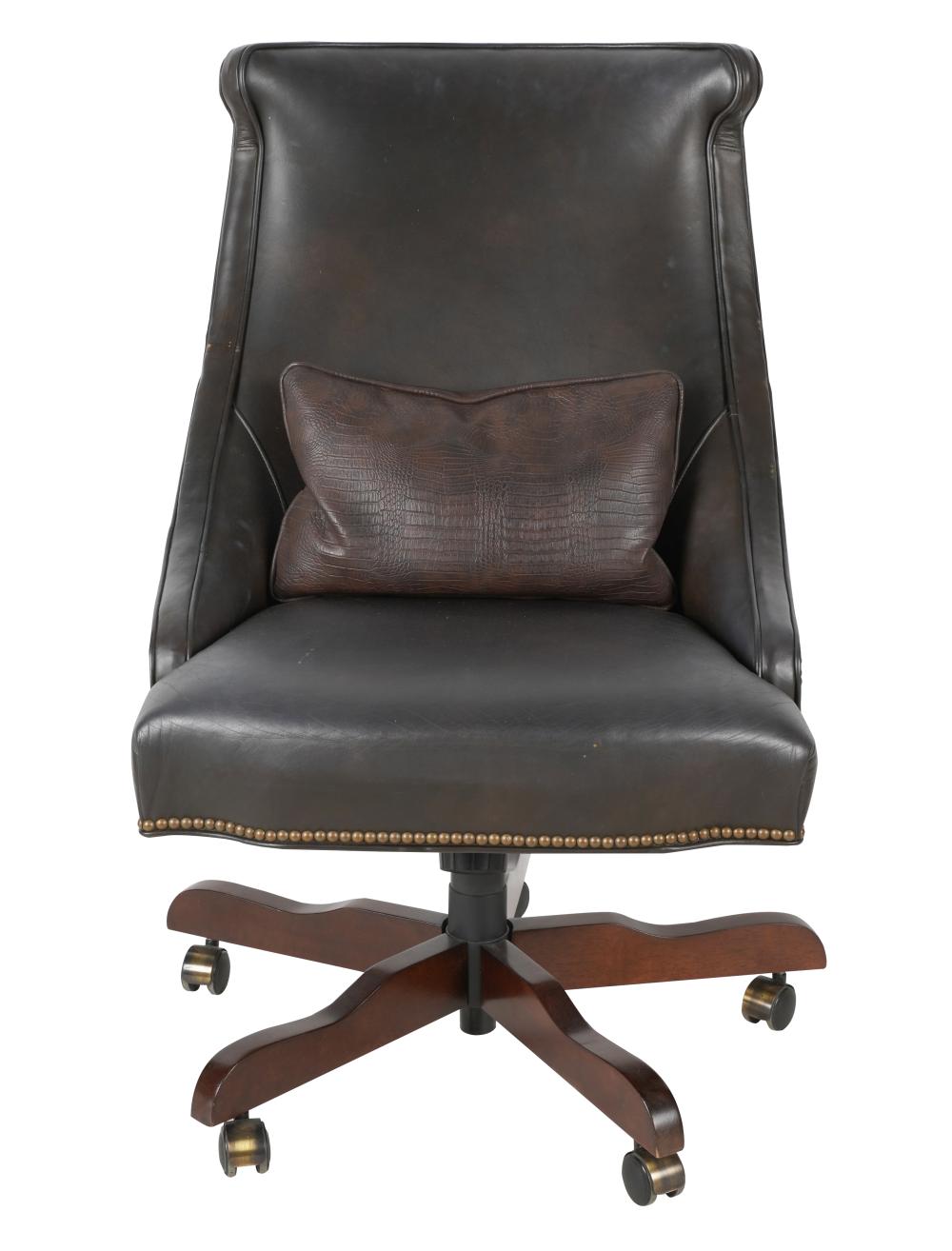 Appraisal: BROWN LEATHER SWIVEL OFFICE CHAIRadjustable height on wooden base with