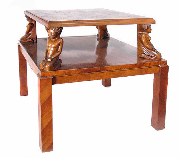 Appraisal: An English side table with carved figural supports square form