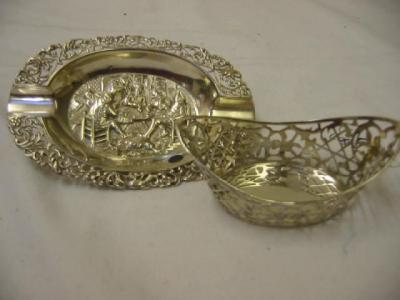 Appraisal: A CONTINENTAL BONBON BASKET of boat form with pierced and