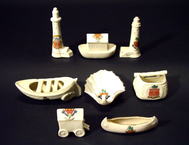 Appraisal: Eight Eastbourne crested china seaside items including two lighthouses a