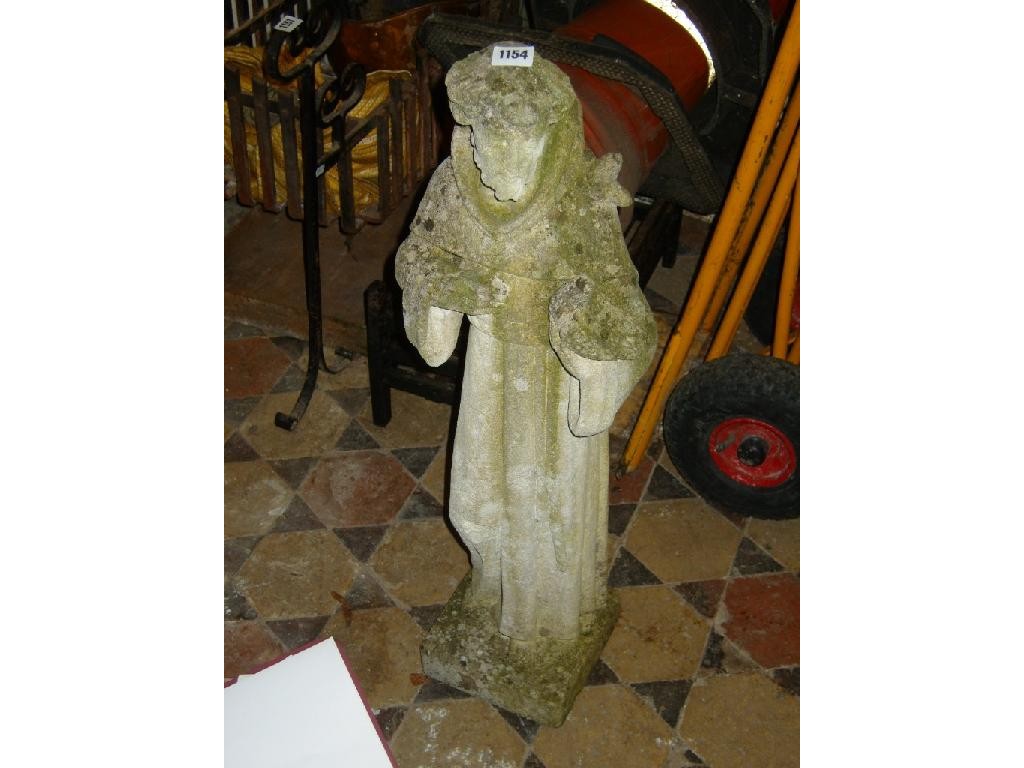 Appraisal: A weathered stone garden figure of St Frances wearing a