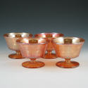 Appraisal: Lot of four carnival glass sherbets with floral and lattice