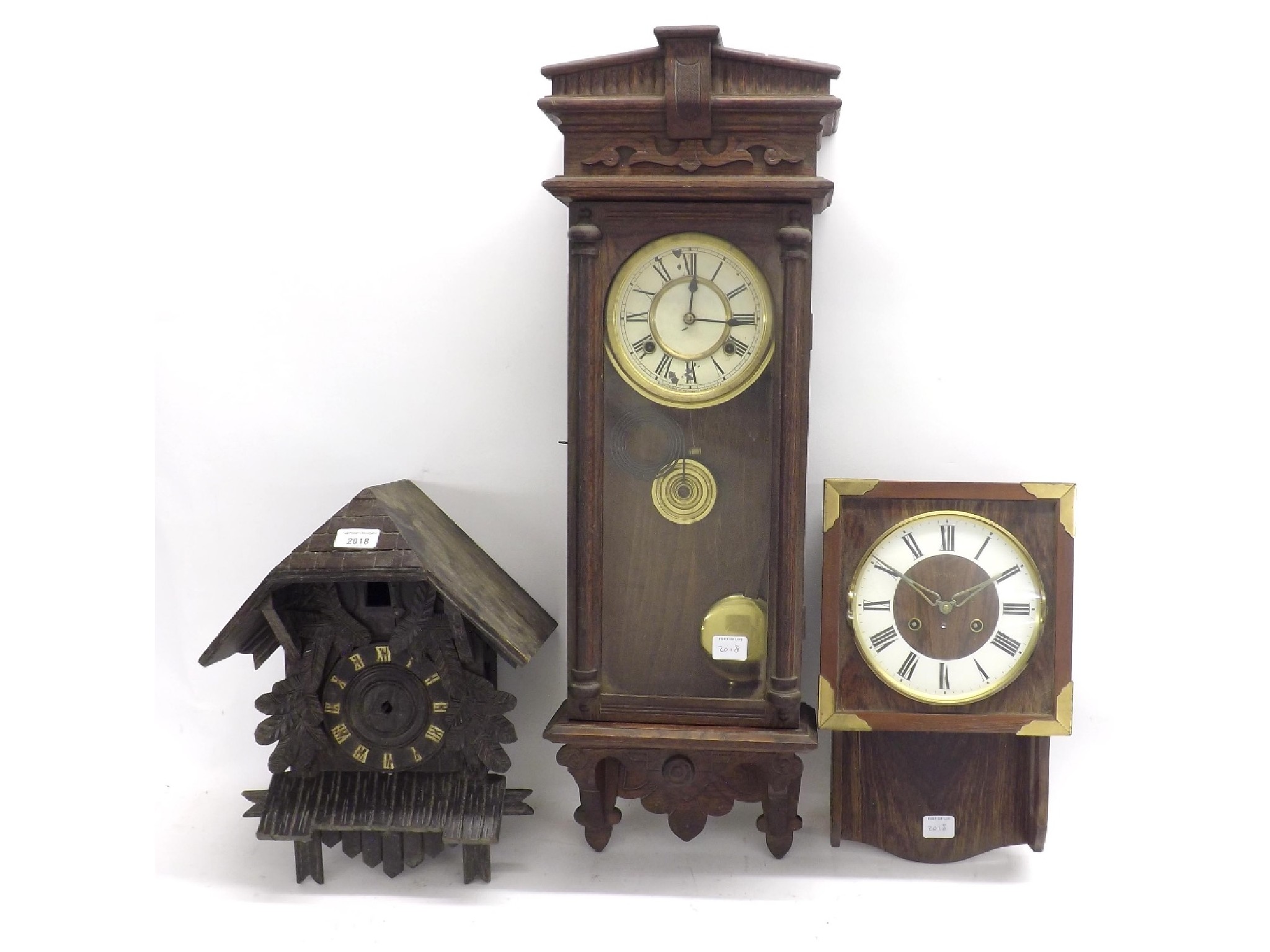 Appraisal: Waterbury two train wall clock within an oak glazed case