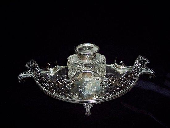 Appraisal: A late Victorian inkstand and pentray the serpentine front engraved