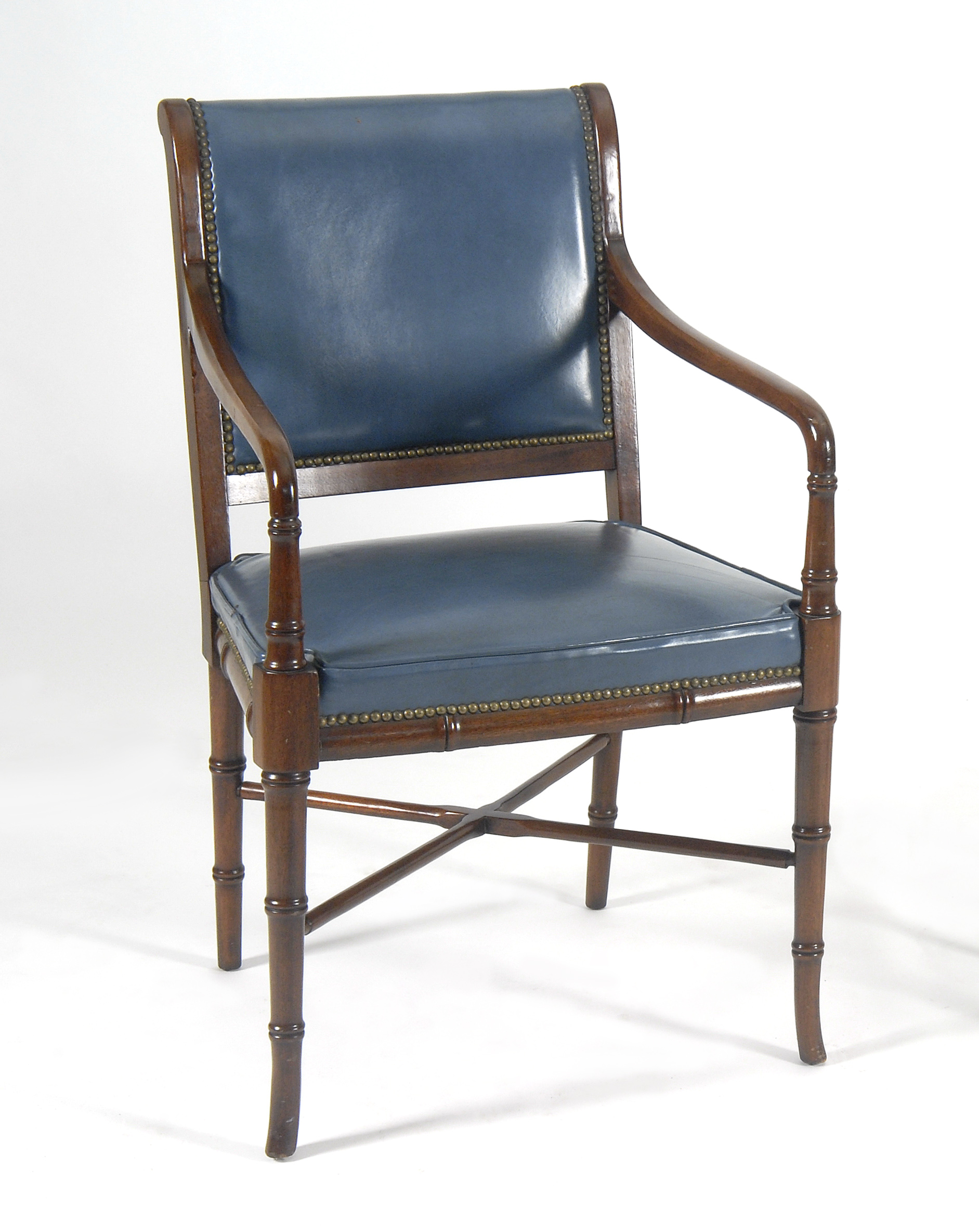 Appraisal: ENGLISH REGENCY-STYLE ARMCHAIR in mahogany with blue leather upholstery Bamboo-turned