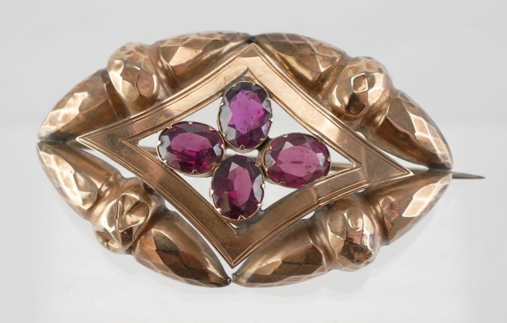 Appraisal: Victorian K gold brooch featuring four amethyst or garnet stones