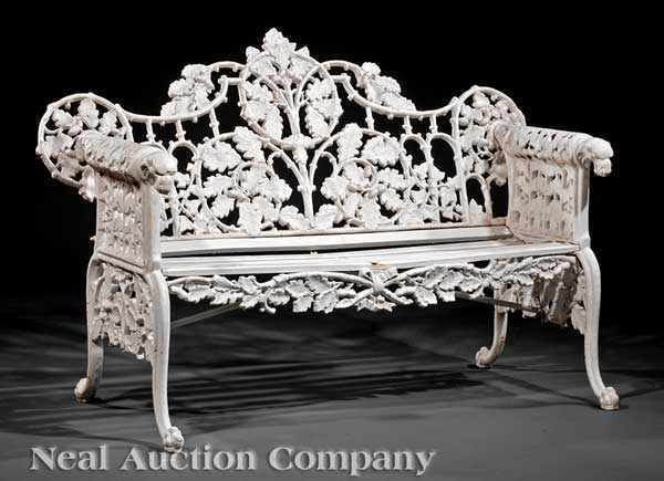 Appraisal: A Pair of Cast Iron Garden Settees after Coalbrookdale the