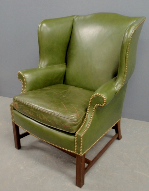 Appraisal: - Vintage Kittinger Chippendale style mahogany and green leather wing