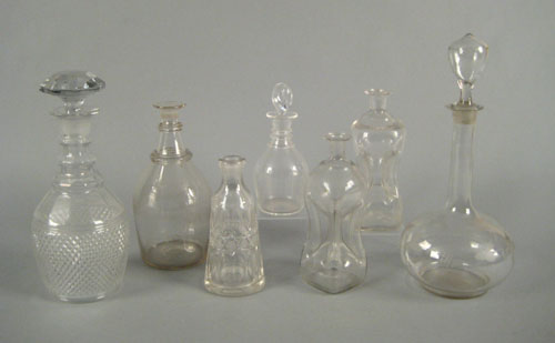 Appraisal: Seven colorless glass bottles and decanters blown and pressed h