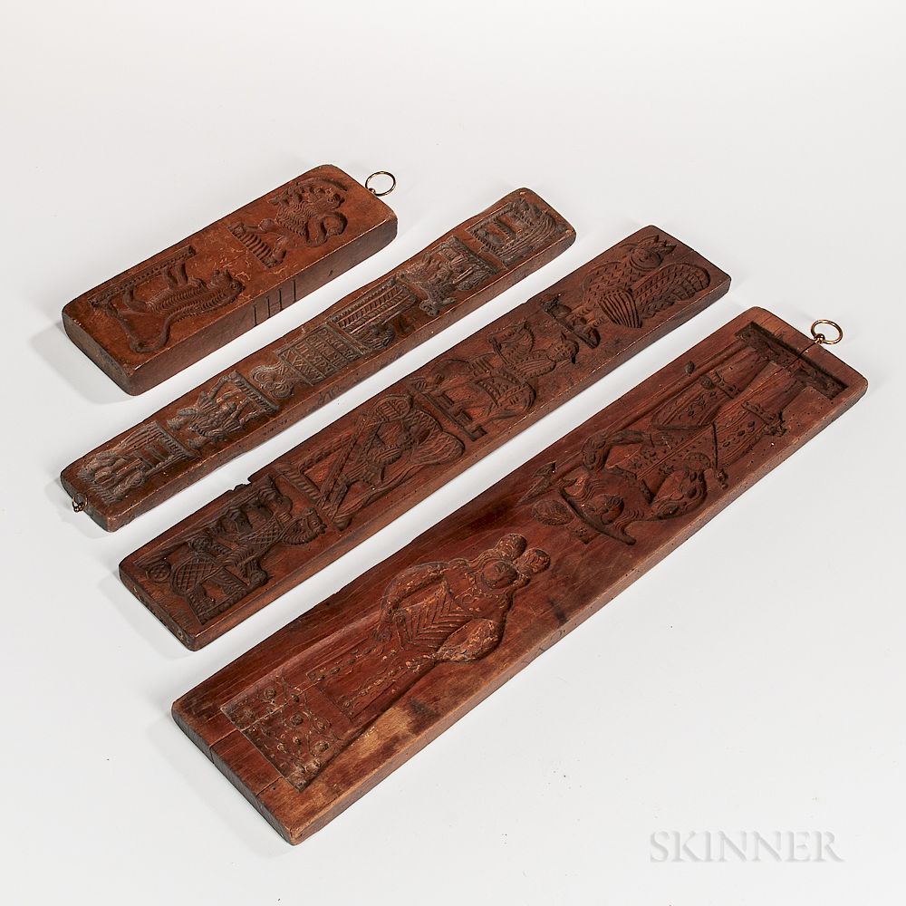 Appraisal: Four Carved Cookie Boards Four Carved Cookie Boards Europe late