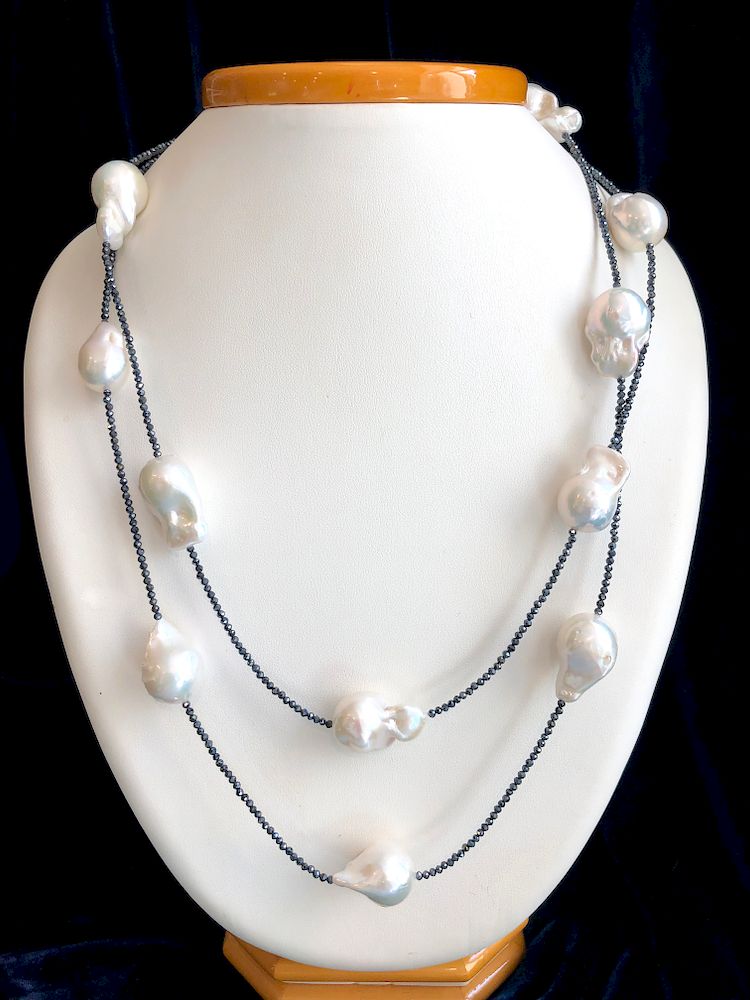 Appraisal: mm x mm White Fresh Water Baroque Pearl and Spinel