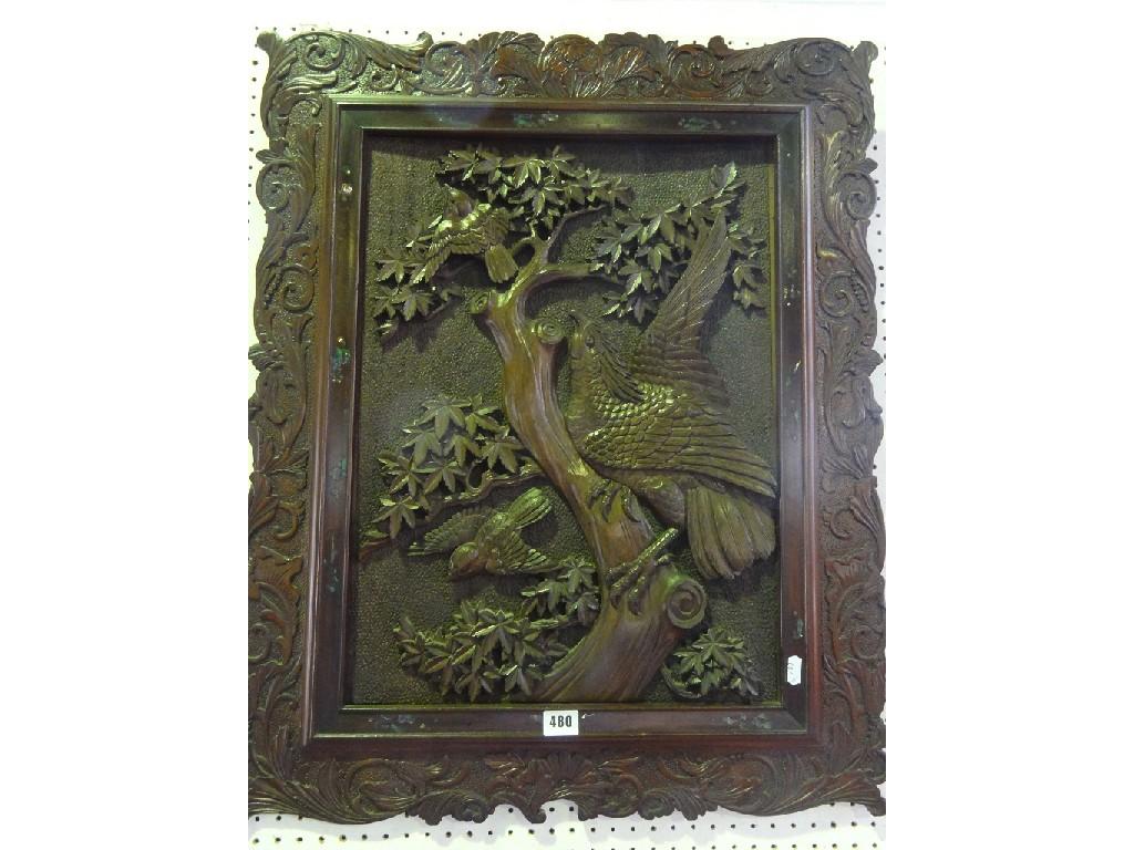 Appraisal: A carved oriental panel depicting a bird of prey hunting