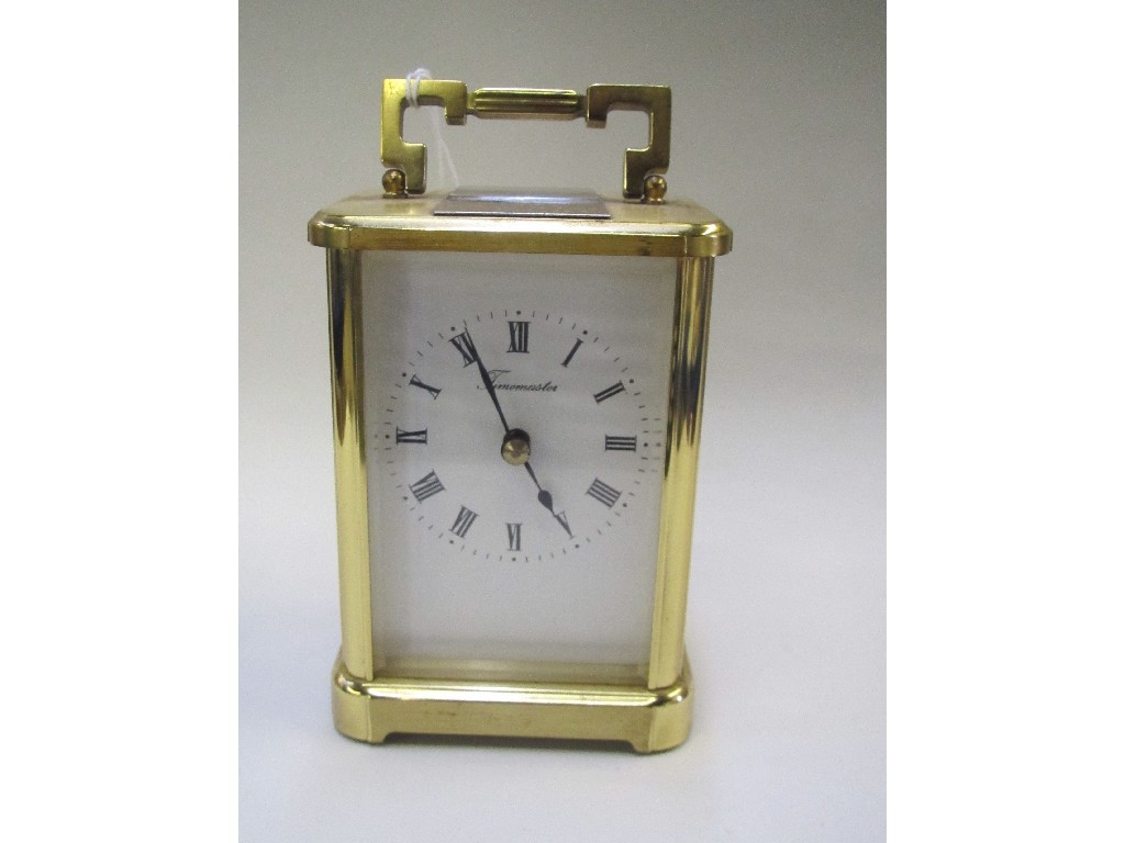 Appraisal: English brass cased carriage clock with presentation plaque