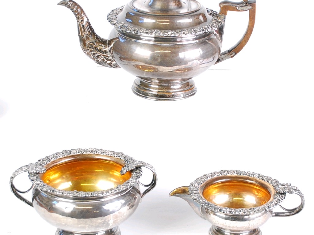 Appraisal: THREE PIECE NINETEENTH CENTURY SILVER ON COPPER TEA SET circular