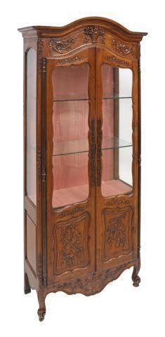 Appraisal: French Louis XV style walnut vitrine display cabinet early th