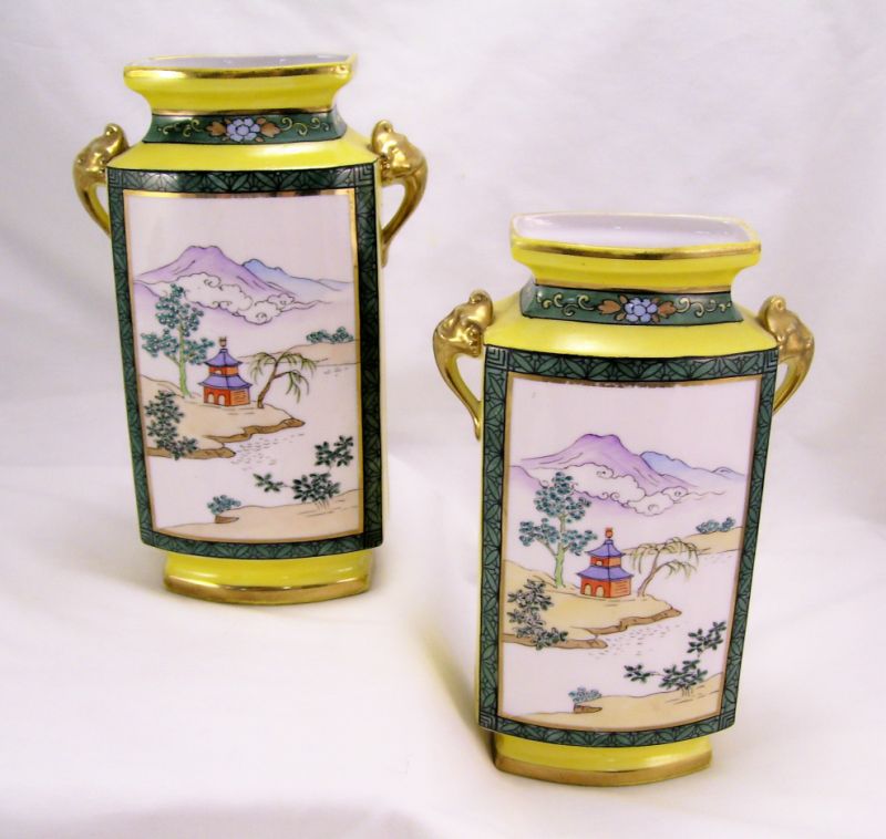 Appraisal: Pair Nippon Porcelain Vases Yellow decorated body with a front