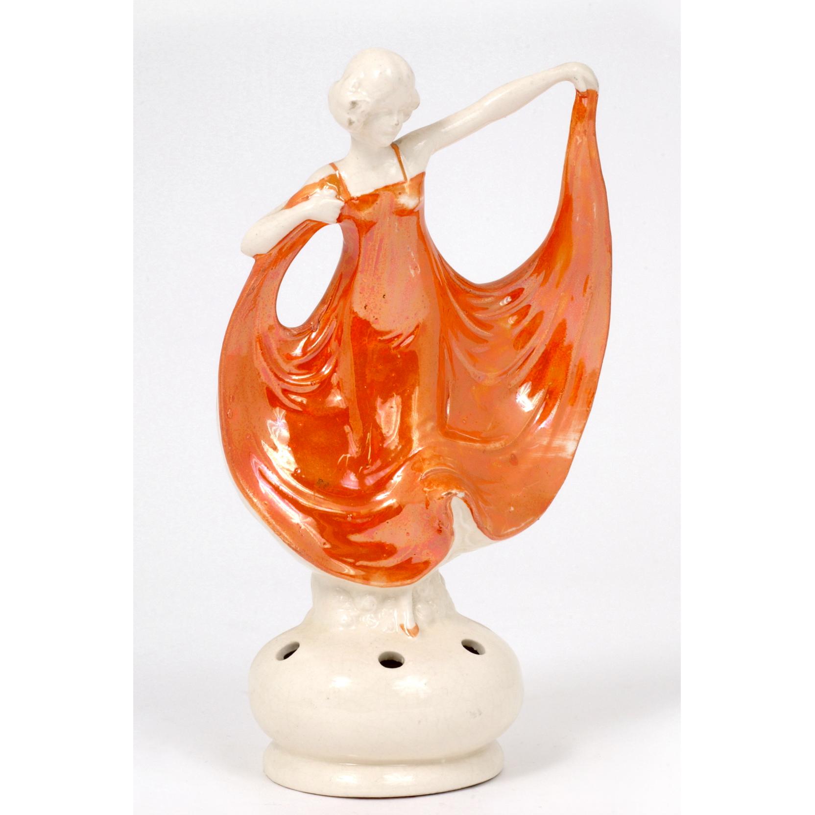 Appraisal: Isadora Duncan Figural Art Deco Flower Frog circa iridescent orange