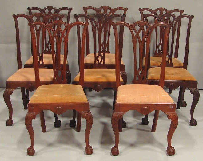 Appraisal: Mahogany scroll back chairs with pierced carved splats shell motif