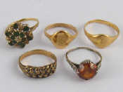 Appraisal: A mixed lot comprising two carat gold rings gms one