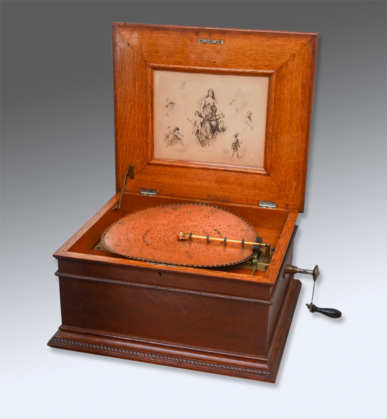 Appraisal: REGINA OAK '' DISC MUSIC BOX WITH DISCS Oak case