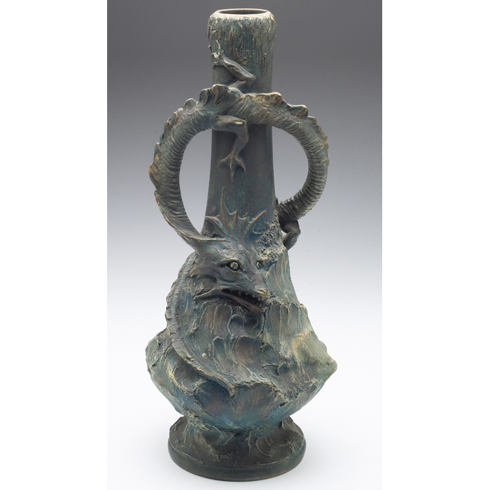 Appraisal: JM Amphora vase unusual form with a sculpted dragon covered