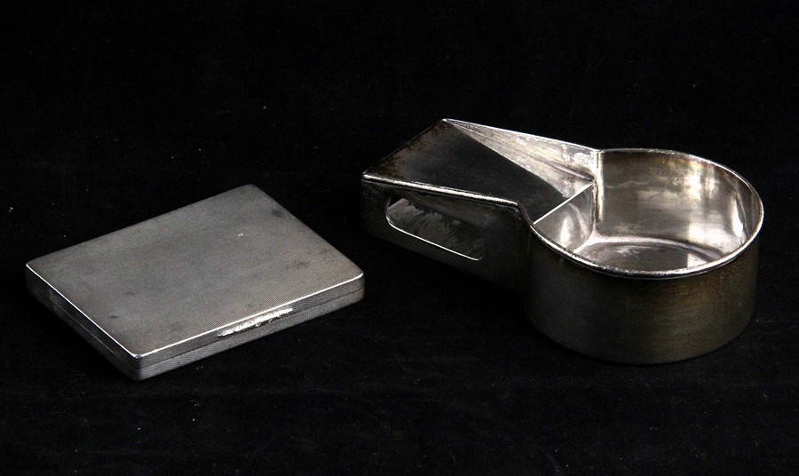 Appraisal: A silver cigarette case Birmingham engine turned decoration throughout and