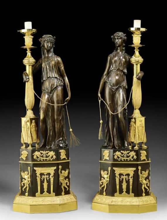 Appraisal: PAIR OF BRONZE FIGURES AS LAMPS Empire style after CLODION