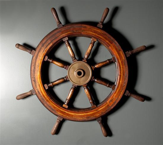 Appraisal: Laminated oak and metal ship's wheel from the World War