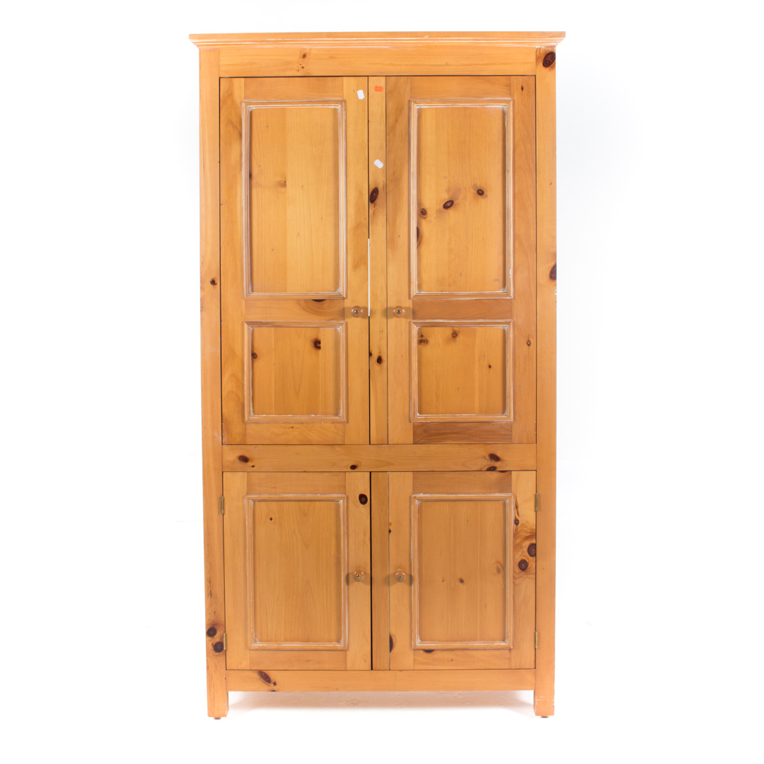 Appraisal: Vernacular paneled pine cabinet four doors in H in W