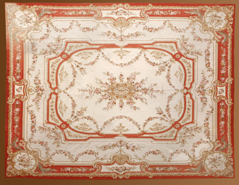 Appraisal: An Aubusson style pink ground carpet An Aubusson style pink