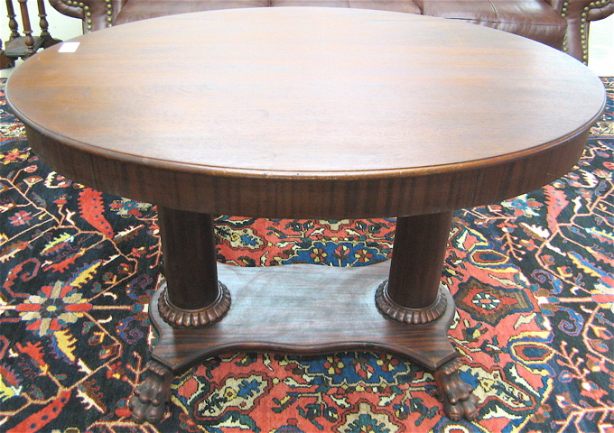 Appraisal: EMPIRE REVIVAL MAHOGANY CENTER TABLE American c having an oval