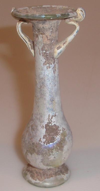 Appraisal: A late Roman double-handled footed kohl-tube made in pale green