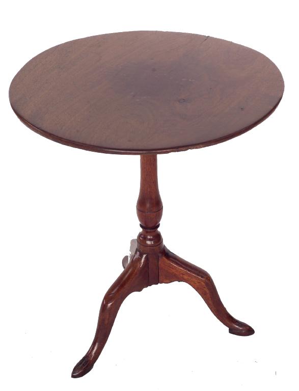 Appraisal: GEORGE III MAHOGANY TILT-TOP TRIPOD TABLE the circular top above