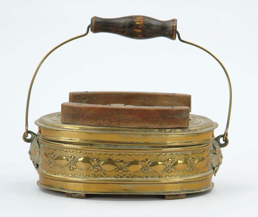 Appraisal: BRASS AND WOOD ANTIQUE FOOT WARMER Oval form having decorative