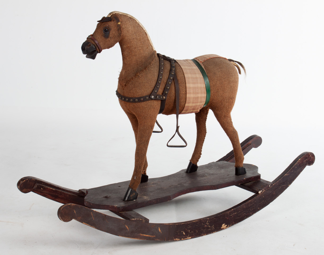 Appraisal: Victorian cloth leather wood rocking horse late th century burlap