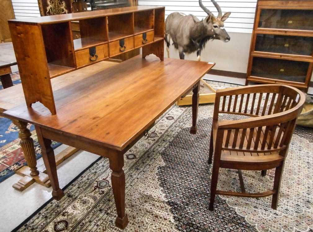 Appraisal: DUTCH COLONIAL STYLE TEAKWOOD BUREAU PLAT AND CHAIR Indonesian late