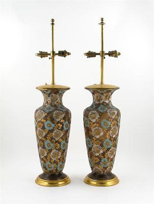 Appraisal: A pair of Doulton stoneware florally decorated lamps with shades