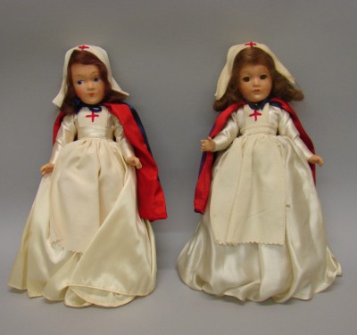 Appraisal: Pair of unmarked composition nurse dolls Has painted eyes the