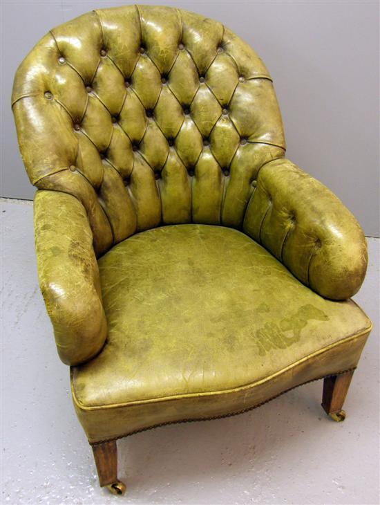 Appraisal: Green leather button back armchair in George III style