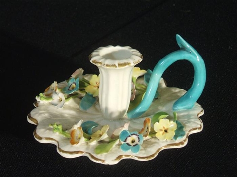 Appraisal: ENGLISH FLOWER ENCRUSTED CHAMBERSTICK Circa perhaps Coalport with stem and