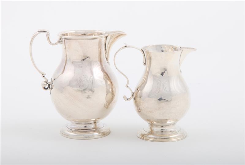 Appraisal: GEORGE I SILVER FOOTED CREAMER AND A SIMILAR GEORGE I