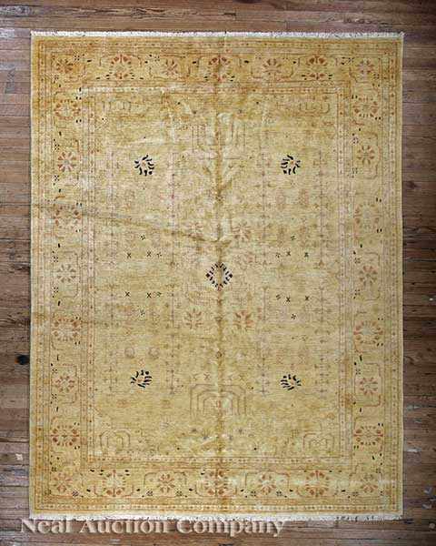 Appraisal: A Peshawar Carpet cream ground floral vine border natural dyes